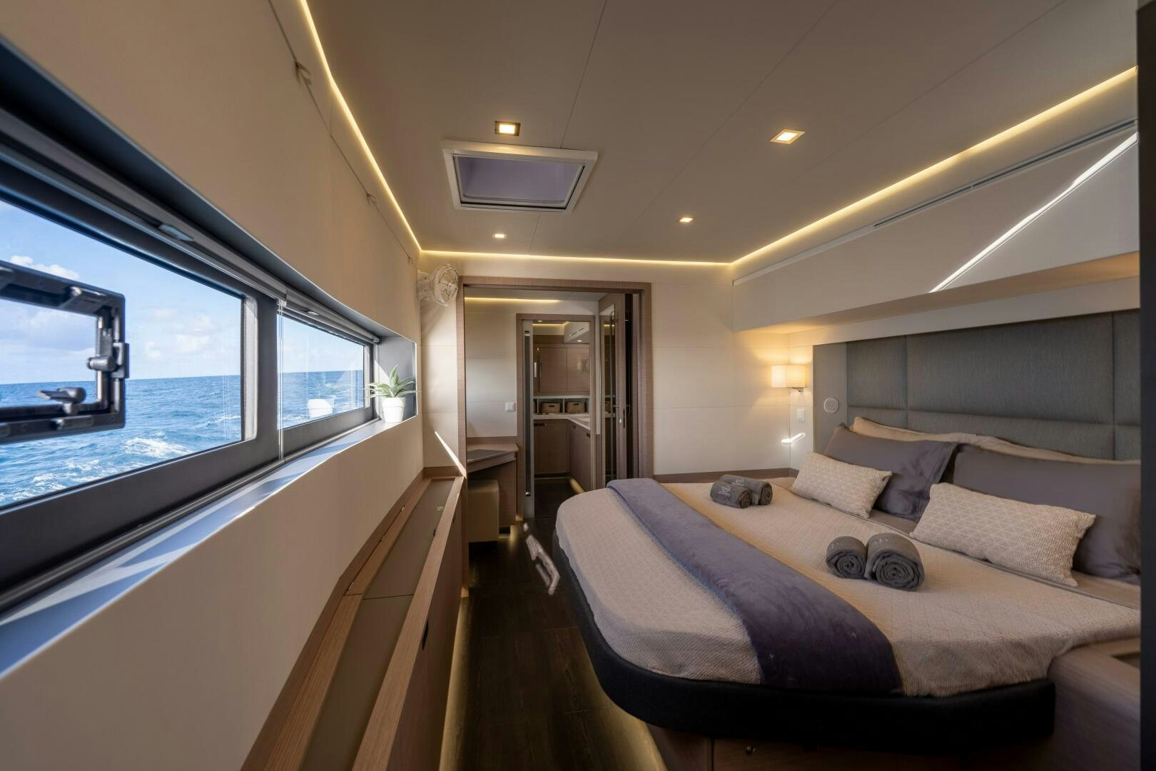 a bed in a room aboard OCEANUS Yacht for Sale