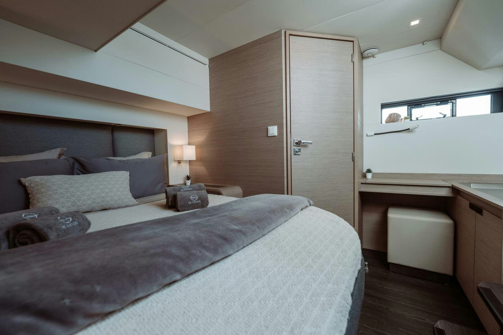 a bed in a room aboard OCEANUS Yacht for Sale