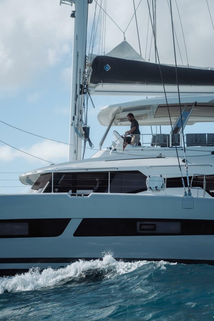 a person on a boat aboard OCEANUS Yacht for Sale