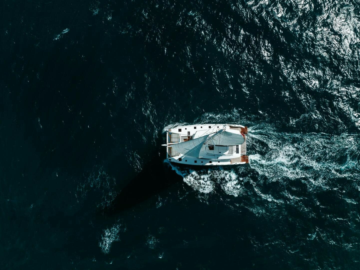 a boat in the water aboard OCEANUS Yacht for Sale