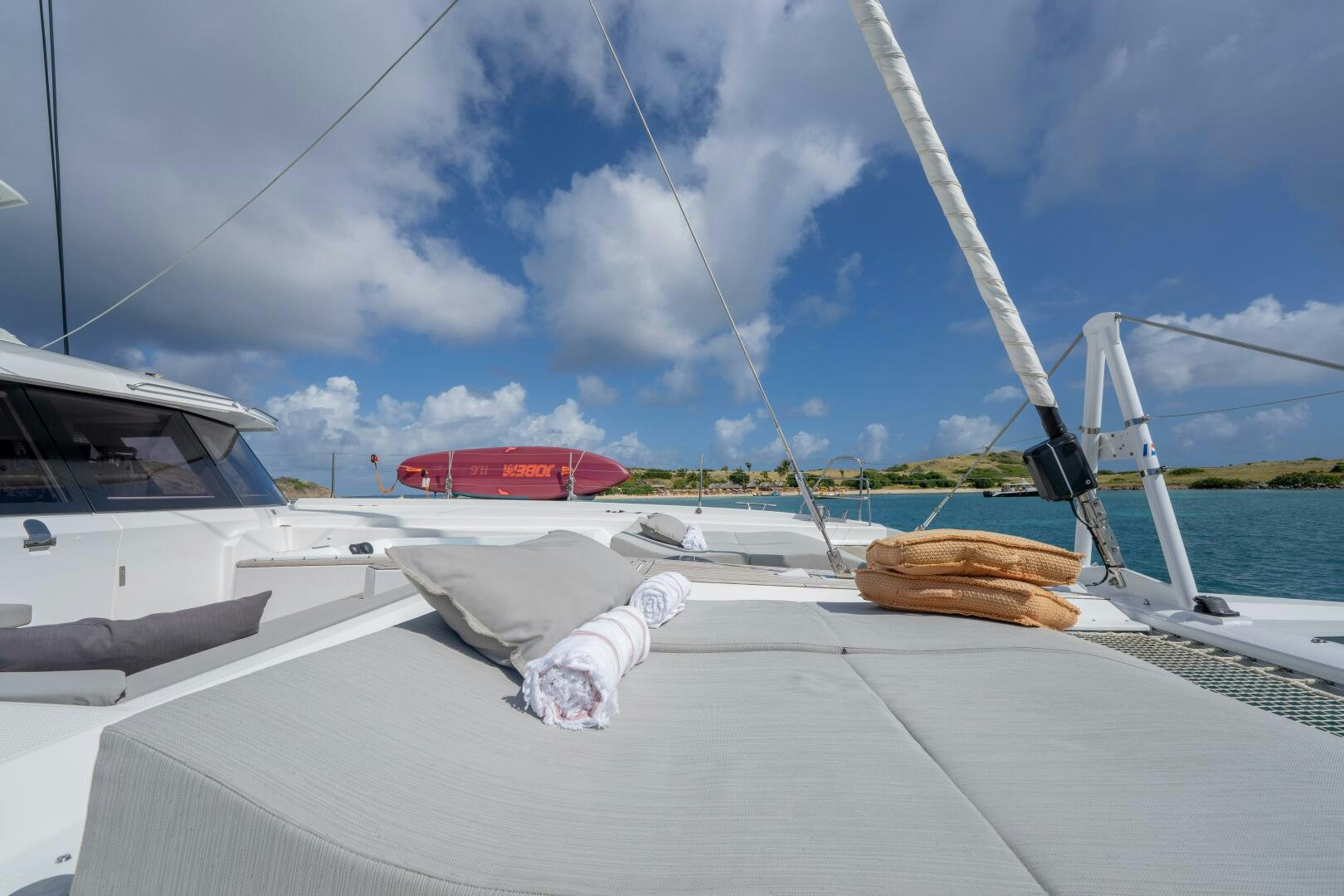 a dog lying on a boat aboard OCEANUS Yacht for Sale
