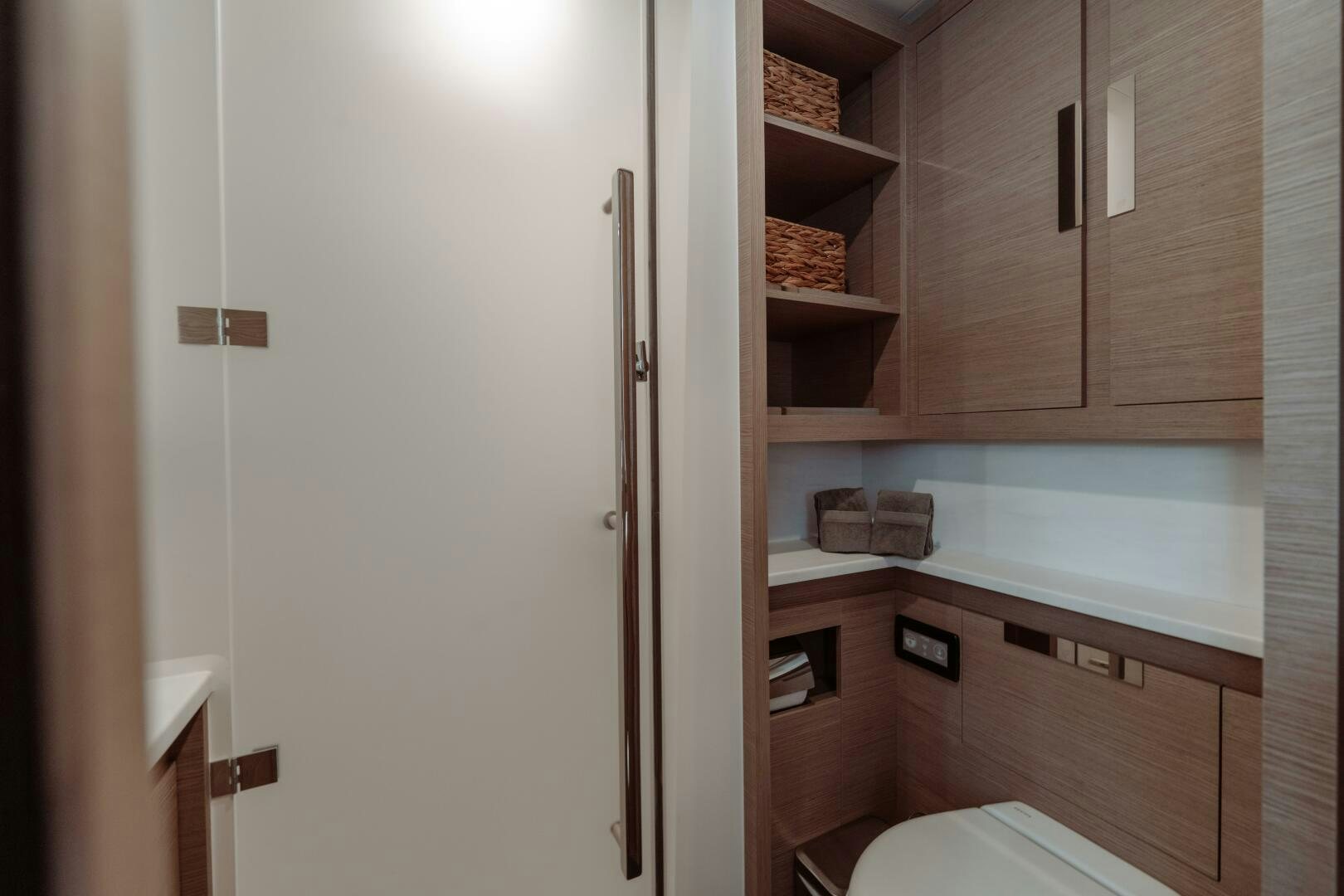 a white door in a kitchen aboard OCEANUS Yacht for Sale