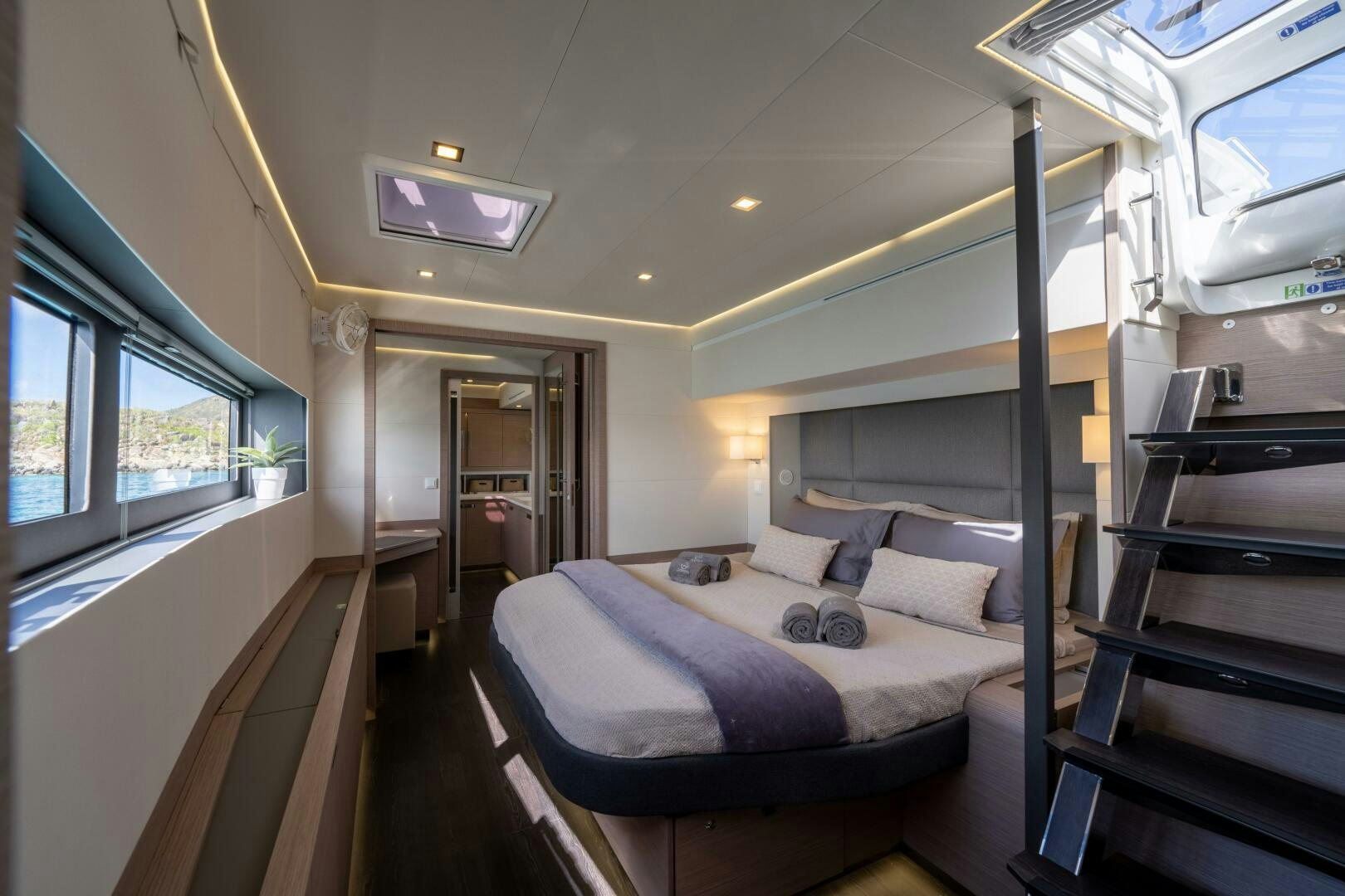 a bed in a room aboard OCEANUS Yacht for Sale