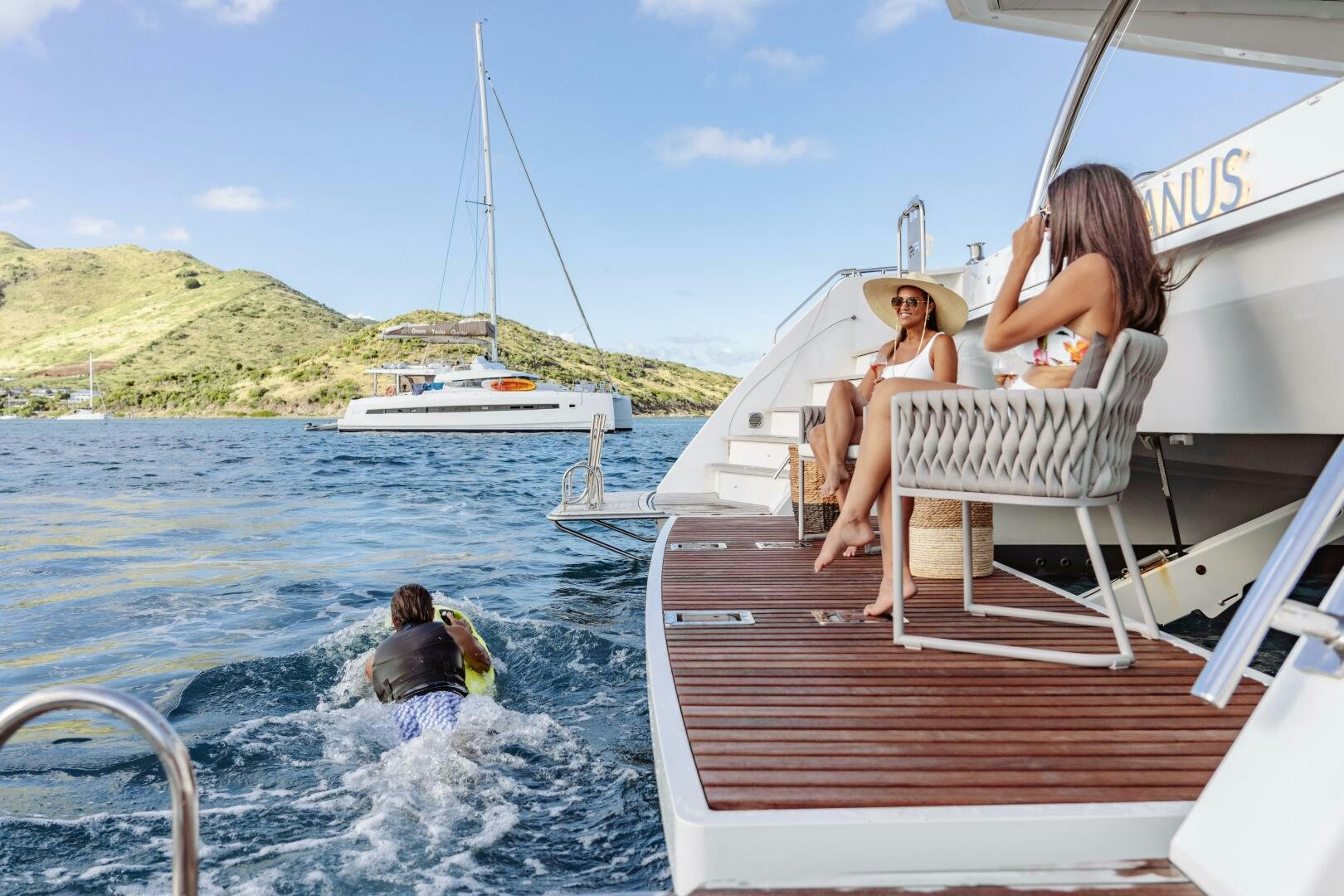 a group of people on a boat aboard OCEANUS Yacht for Sale