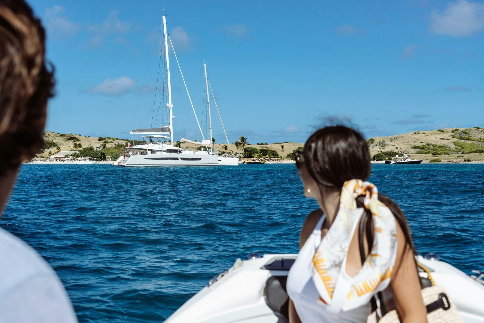 a person sitting on a boat aboard OCEANUS Yacht for Sale
