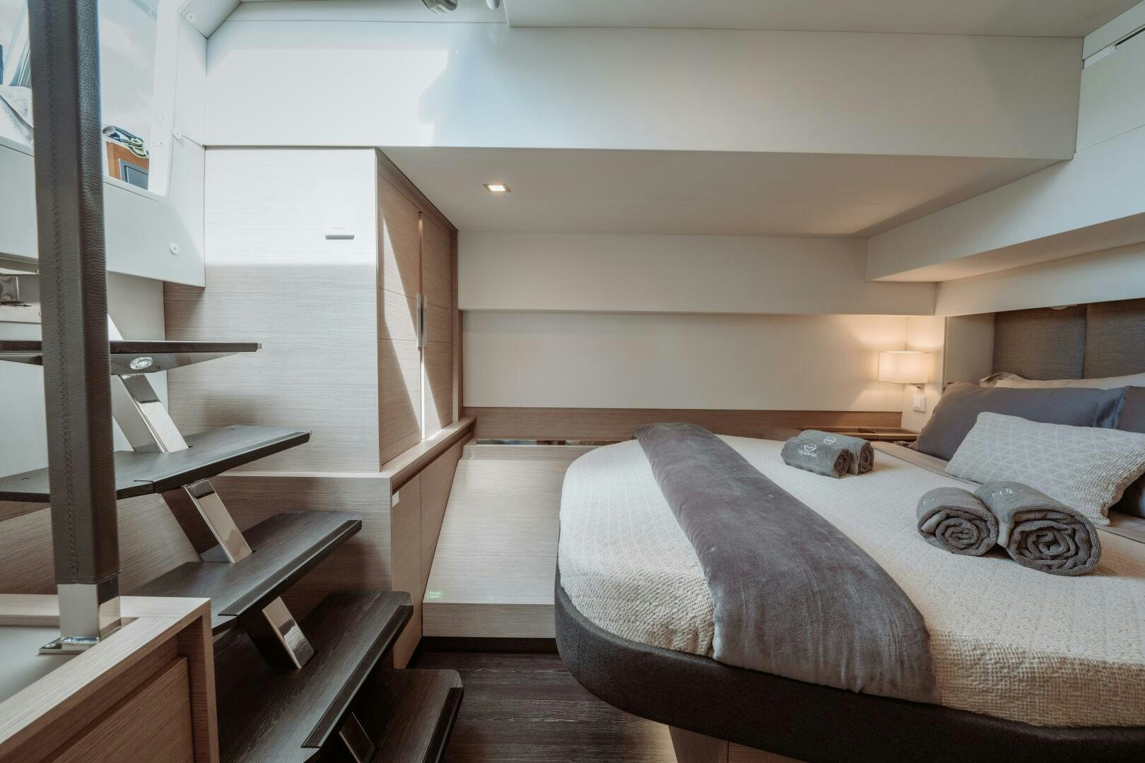 a bed in a room aboard OCEANUS Yacht for Sale