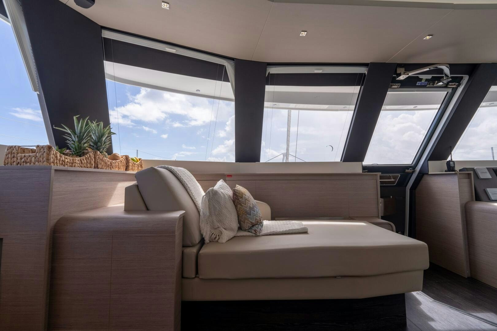 a couch in a car aboard OCEANUS Yacht for Sale