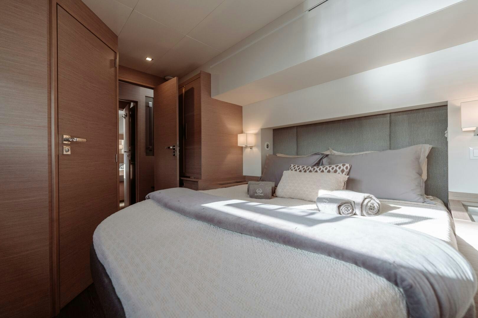 a bed in a hotel room aboard OCEANUS Yacht for Sale