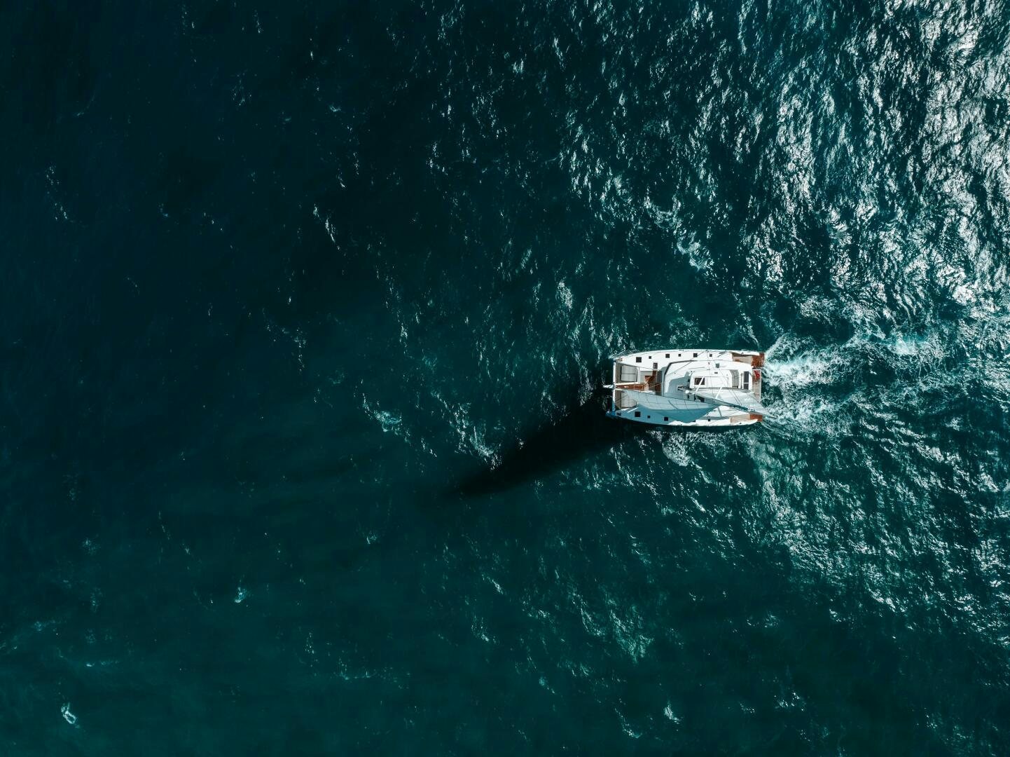 a boat in the water aboard OCEANUS Yacht for Sale
