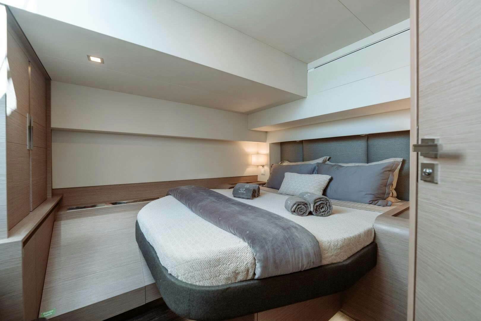 a bed in a room aboard OCEANUS Yacht for Sale
