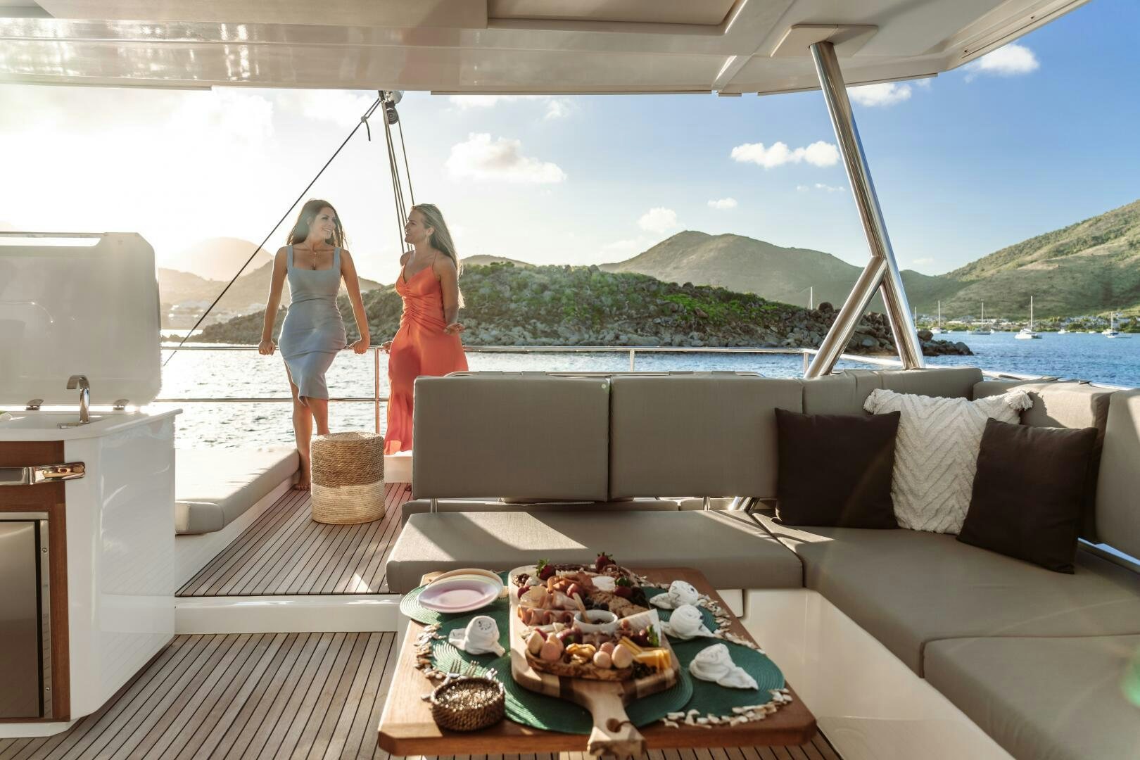 a couple of women on a boat aboard OCEANUS Yacht for Sale