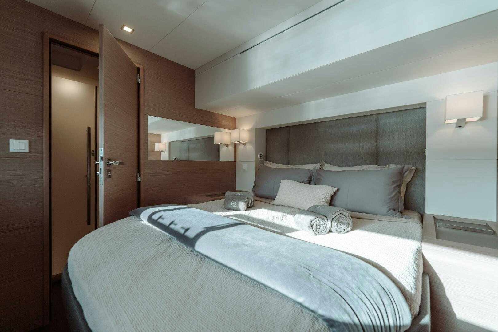 a bed in a hotel room aboard OCEANUS Yacht for Sale