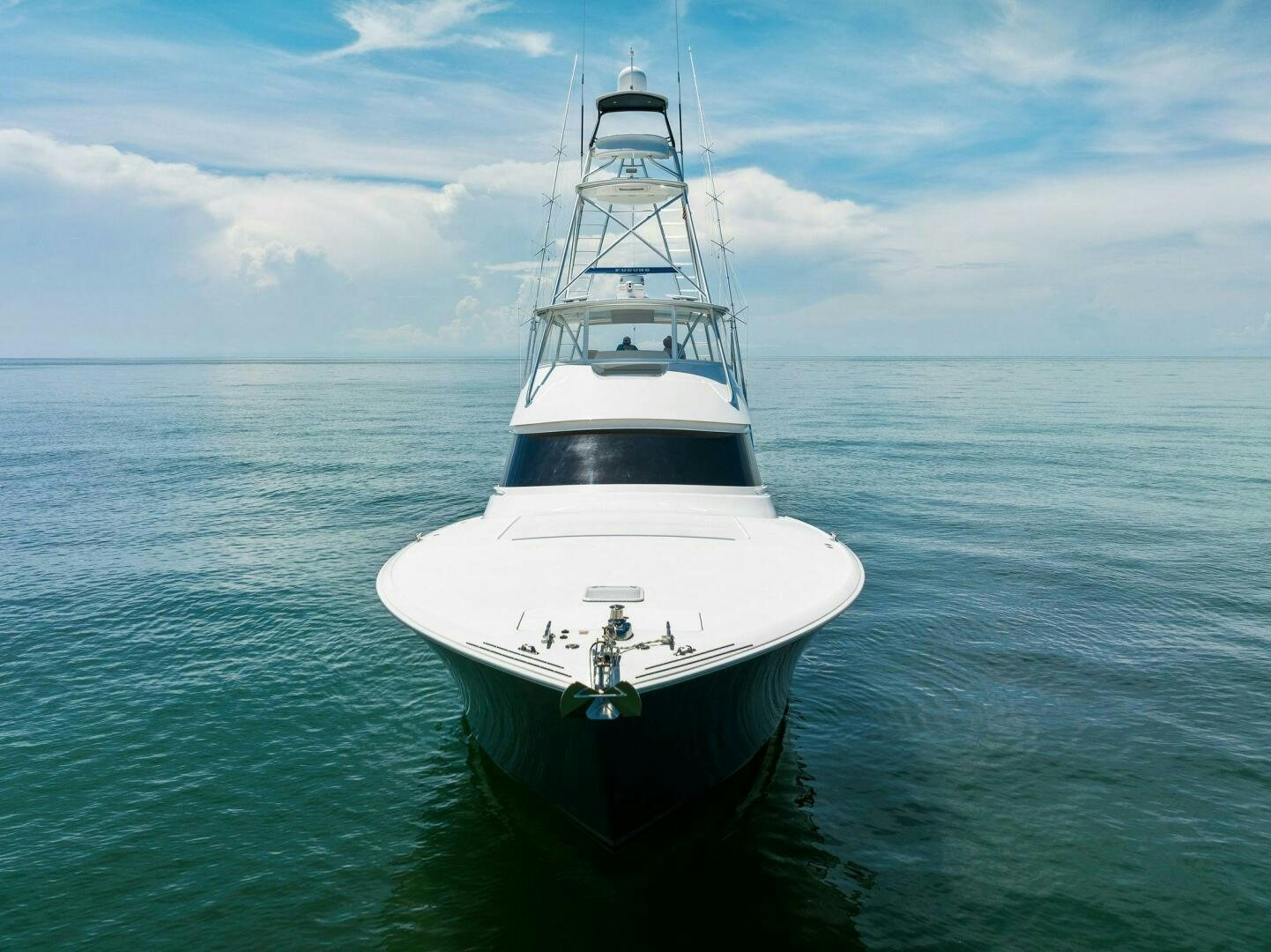 a white boat in the water aboard SEA HAWK Yacht for Sale
