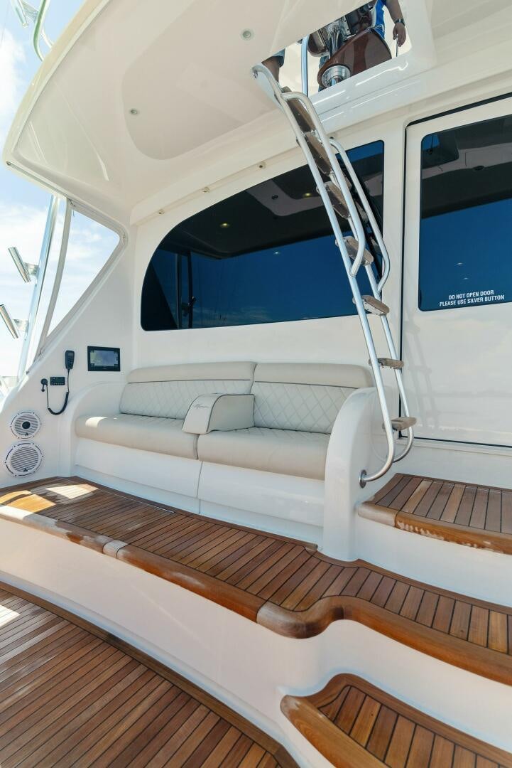 a white boat with a ladder on the deck aboard SEA HAWK Yacht for Sale