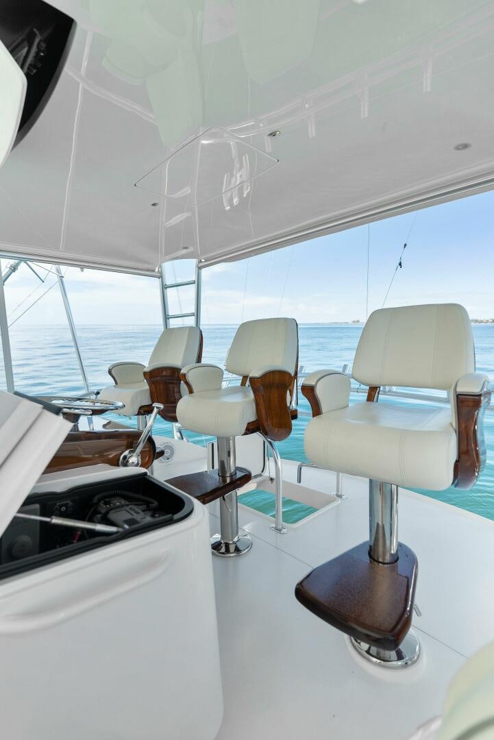 a room with chairs and a table aboard SEA HAWK Yacht for Sale