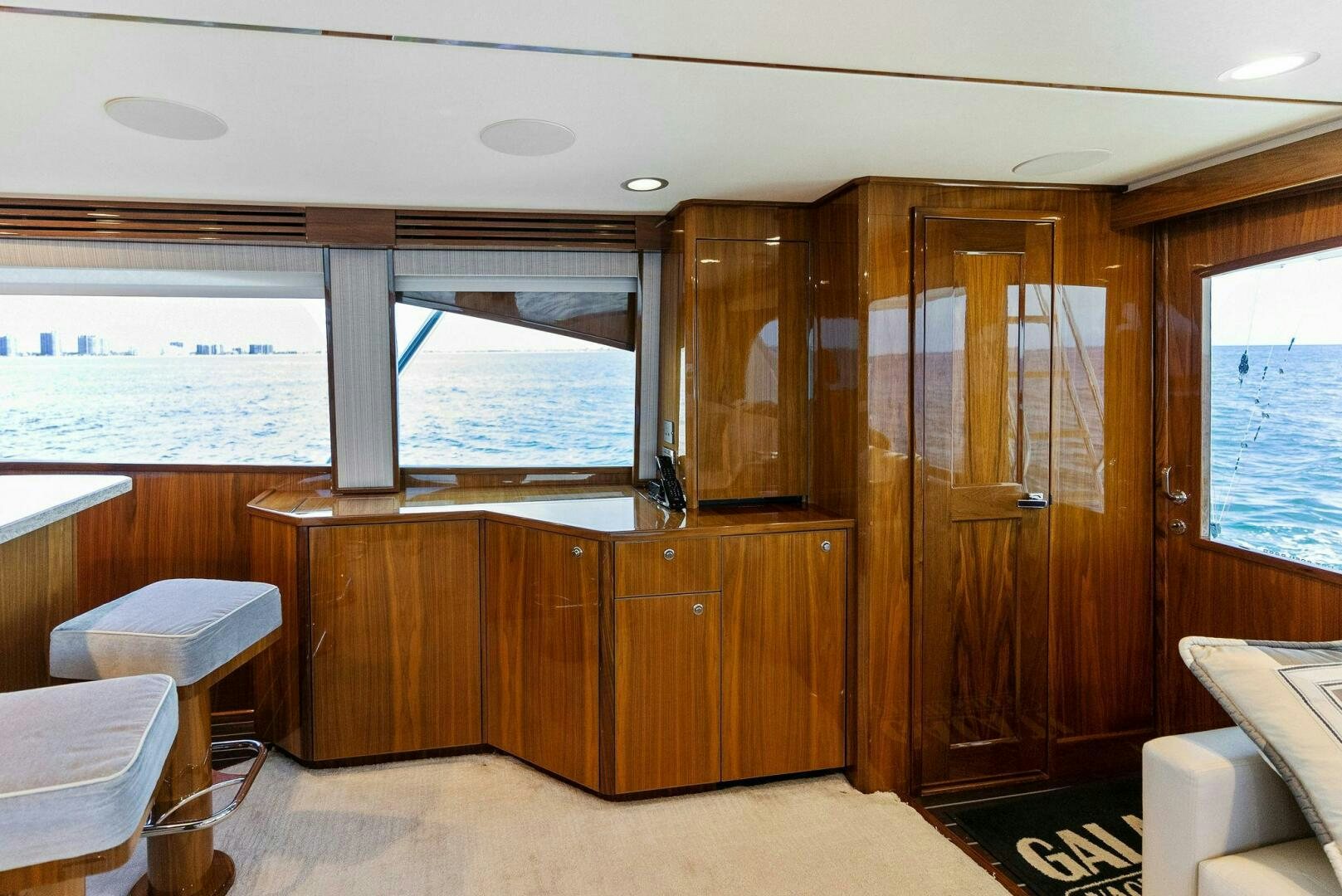 a room with wooden cabinets aboard SEA HAWK Yacht for Sale
