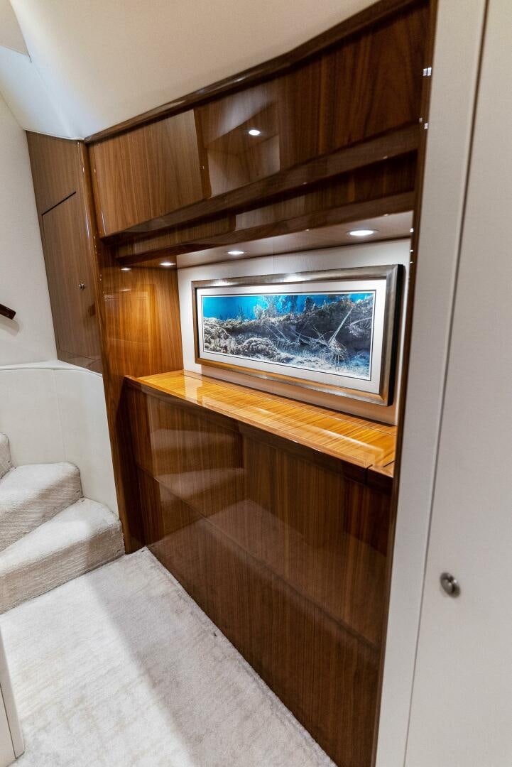 a room with a television and a bed aboard SEA HAWK Yacht for Sale