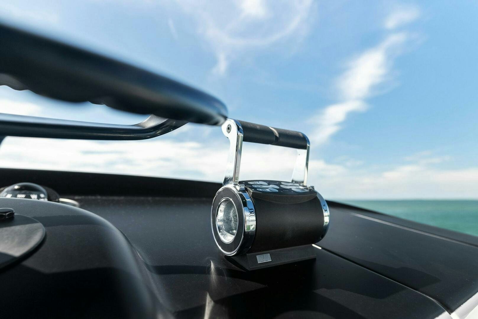 a steering wheel and dashboard of a car aboard SEA HAWK Yacht for Sale