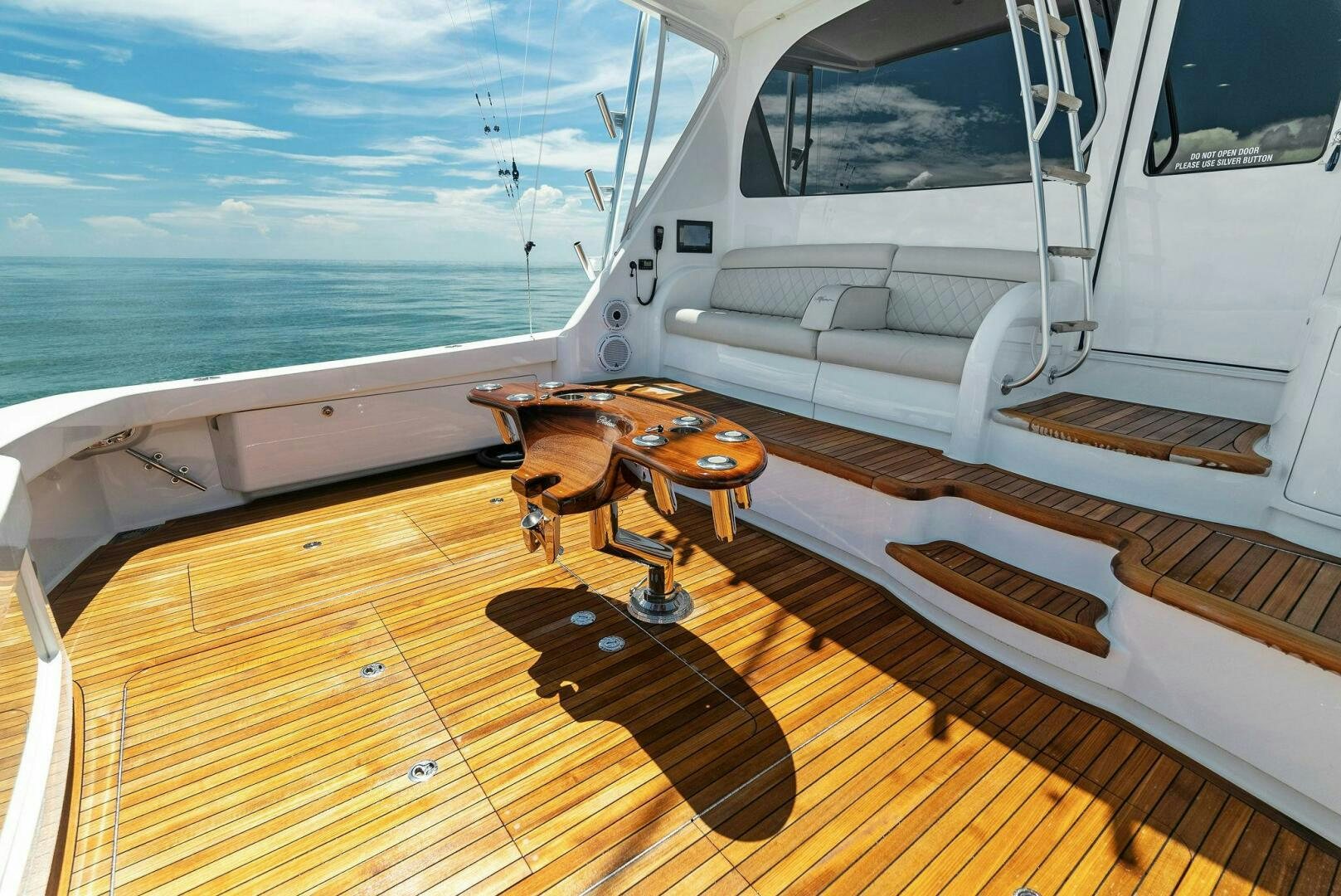 a wooden boat on a deck aboard SEA HAWK Yacht for Sale