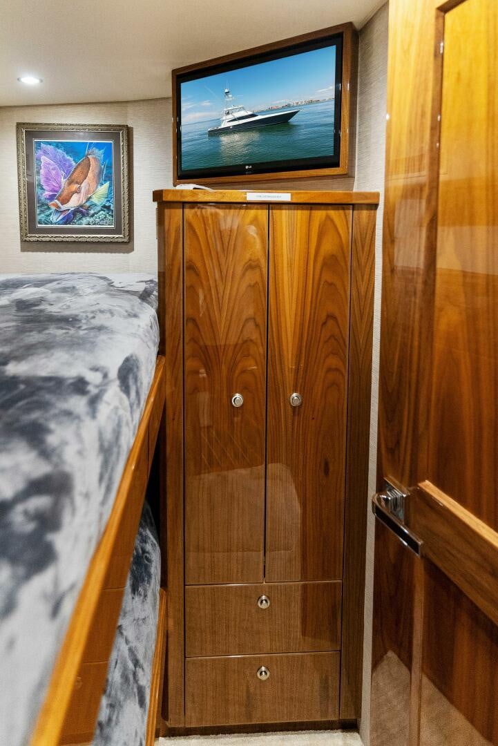 a tv on a cabinet aboard SEA HAWK Yacht for Sale