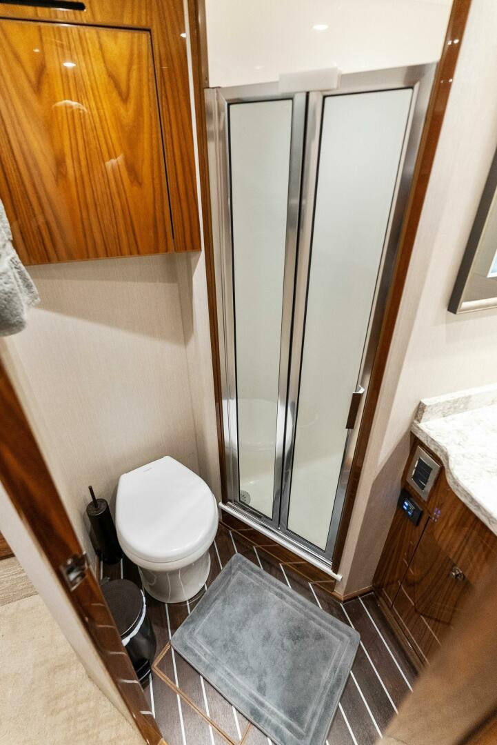 a bathroom with a shower unit aboard SEA HAWK Yacht for Sale