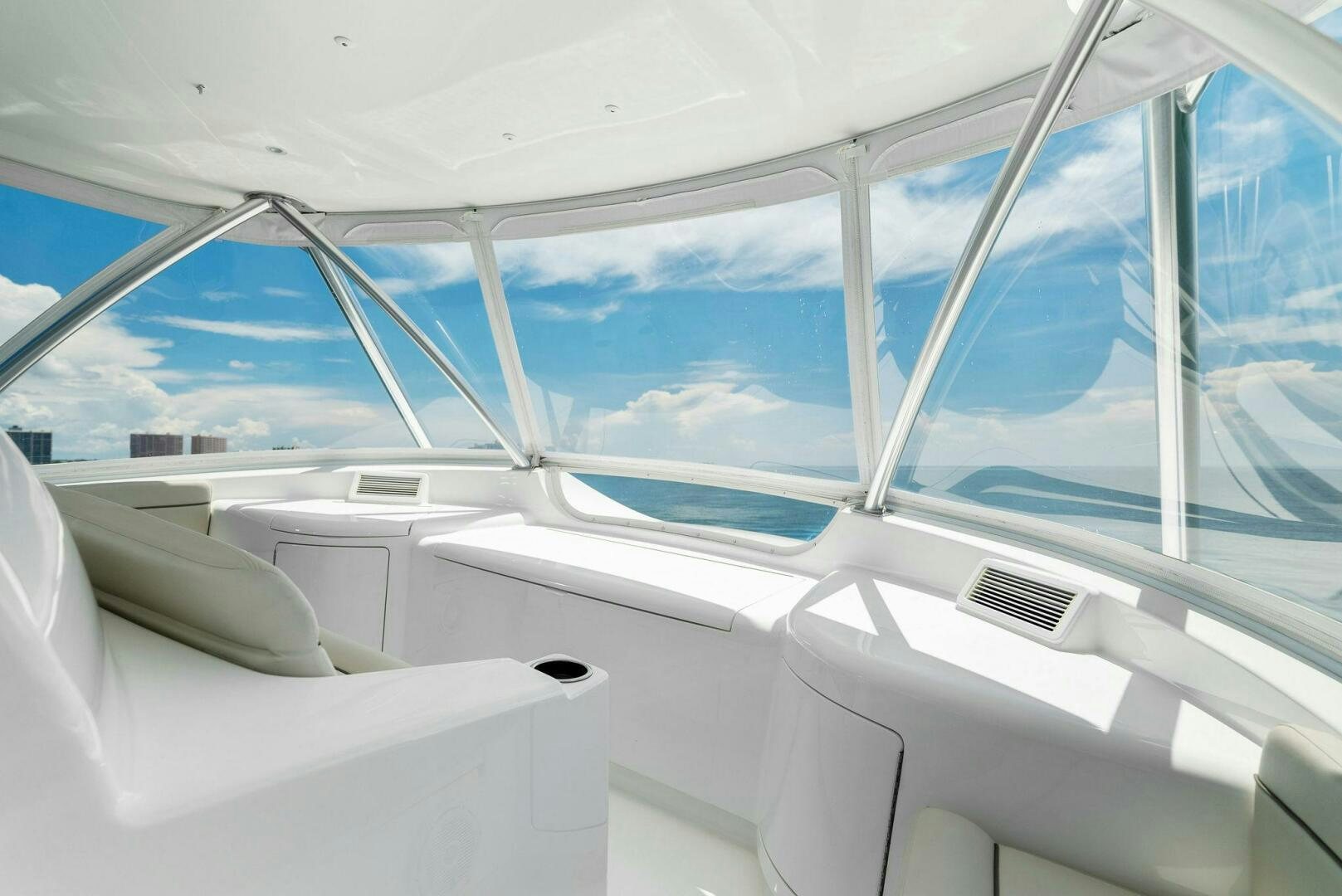 the inside of a white car aboard SEA HAWK Yacht for Sale