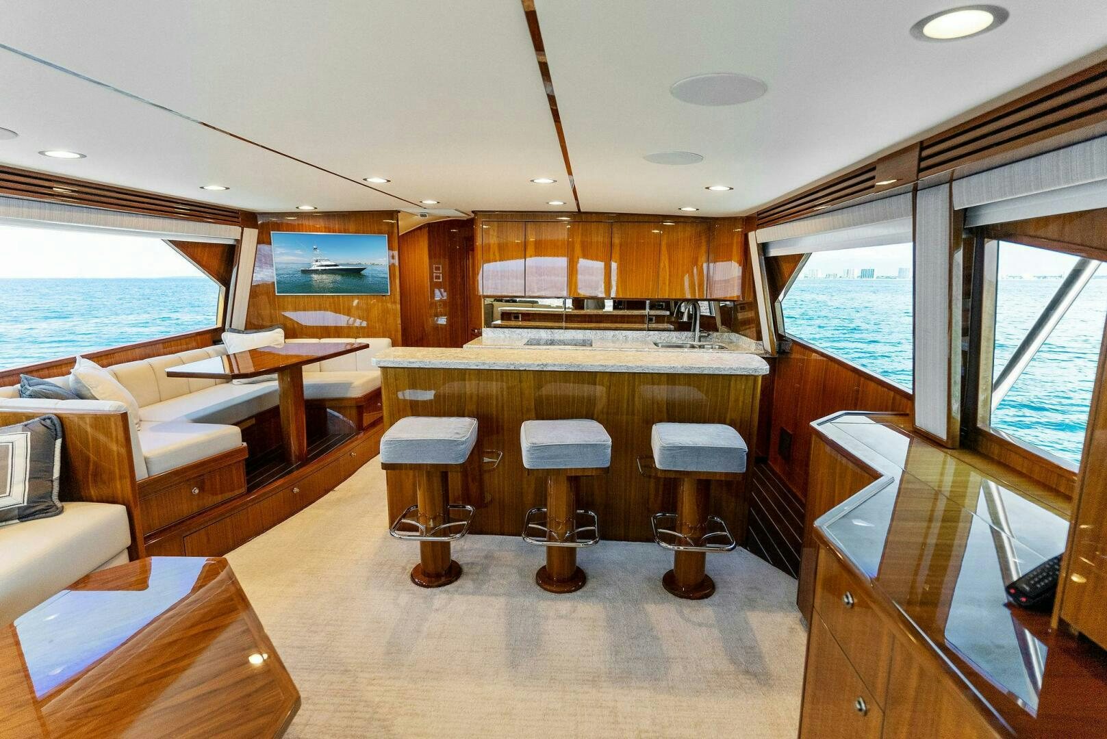 a room with wooden furniture aboard SEA HAWK Yacht for Sale