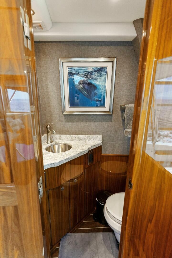 a bathroom with a sink and a toilet aboard SEA HAWK Yacht for Sale
