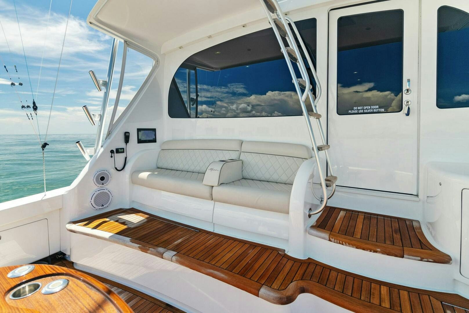 a boat with a couch aboard SEA HAWK Yacht for Sale