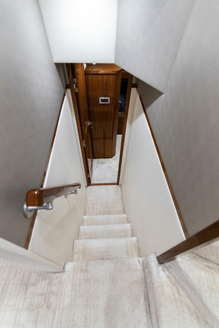 a wooden door leading to a room aboard SEA HAWK Yacht for Sale