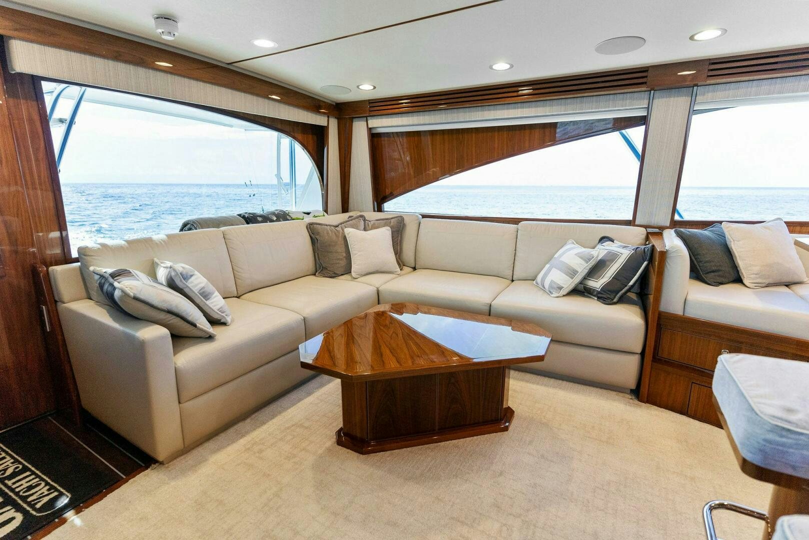 a living room with a couch and a table aboard SEA HAWK Yacht for Sale