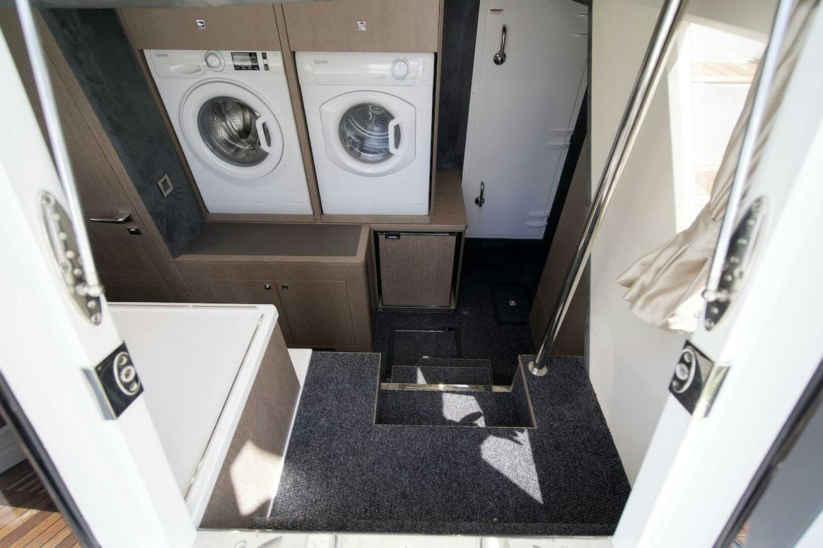 a room with a washing machine aboard OUR NEXT CHAPTER Yacht for Sale
