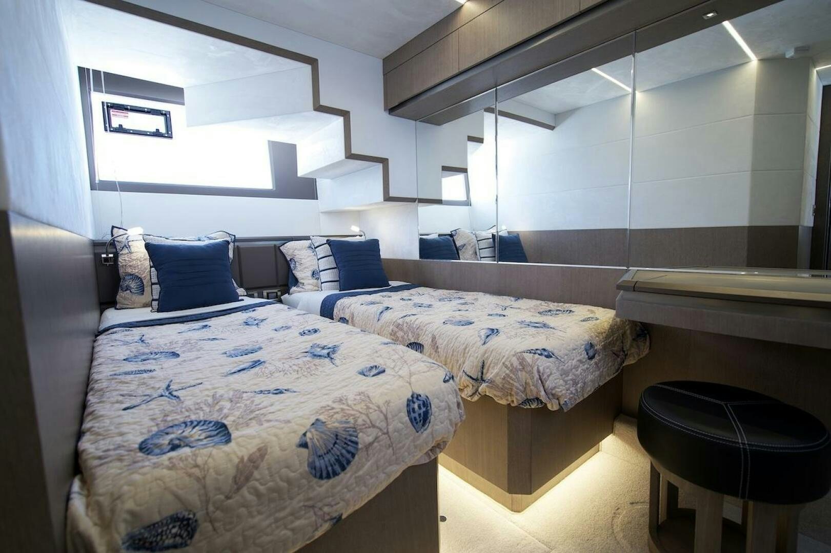 a room with two beds aboard OUR NEXT CHAPTER Yacht for Sale