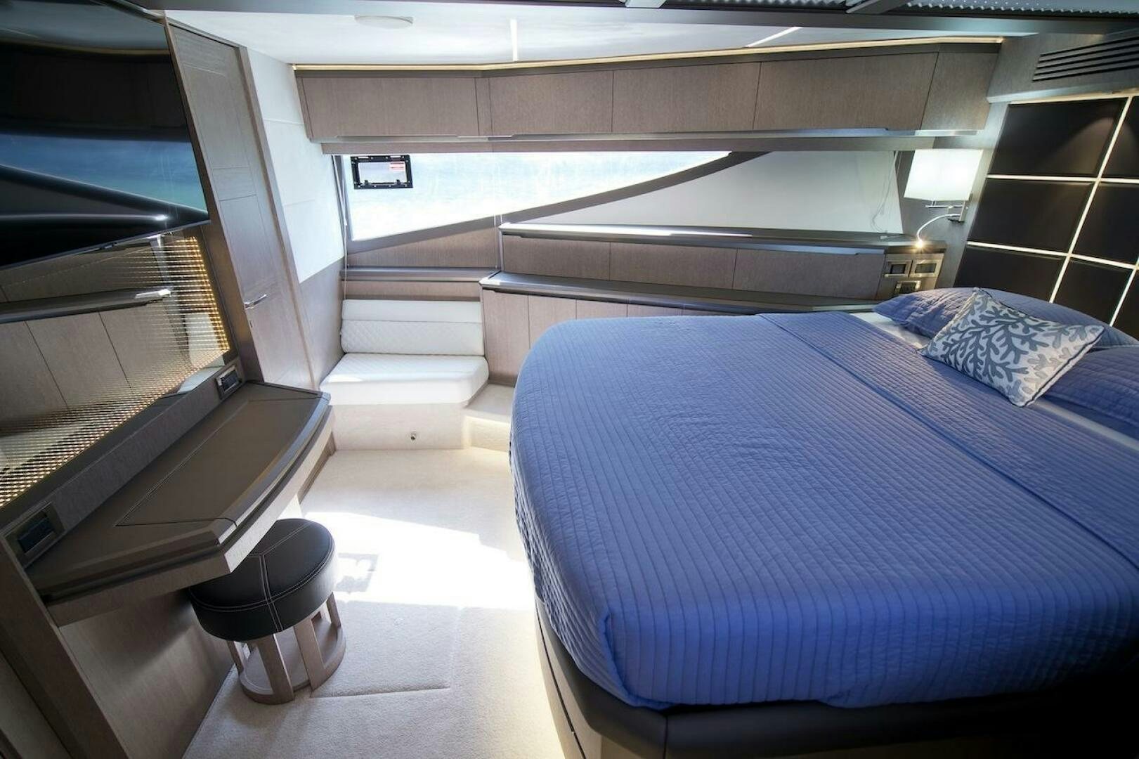a bed in a room aboard OUR NEXT CHAPTER Yacht for Sale