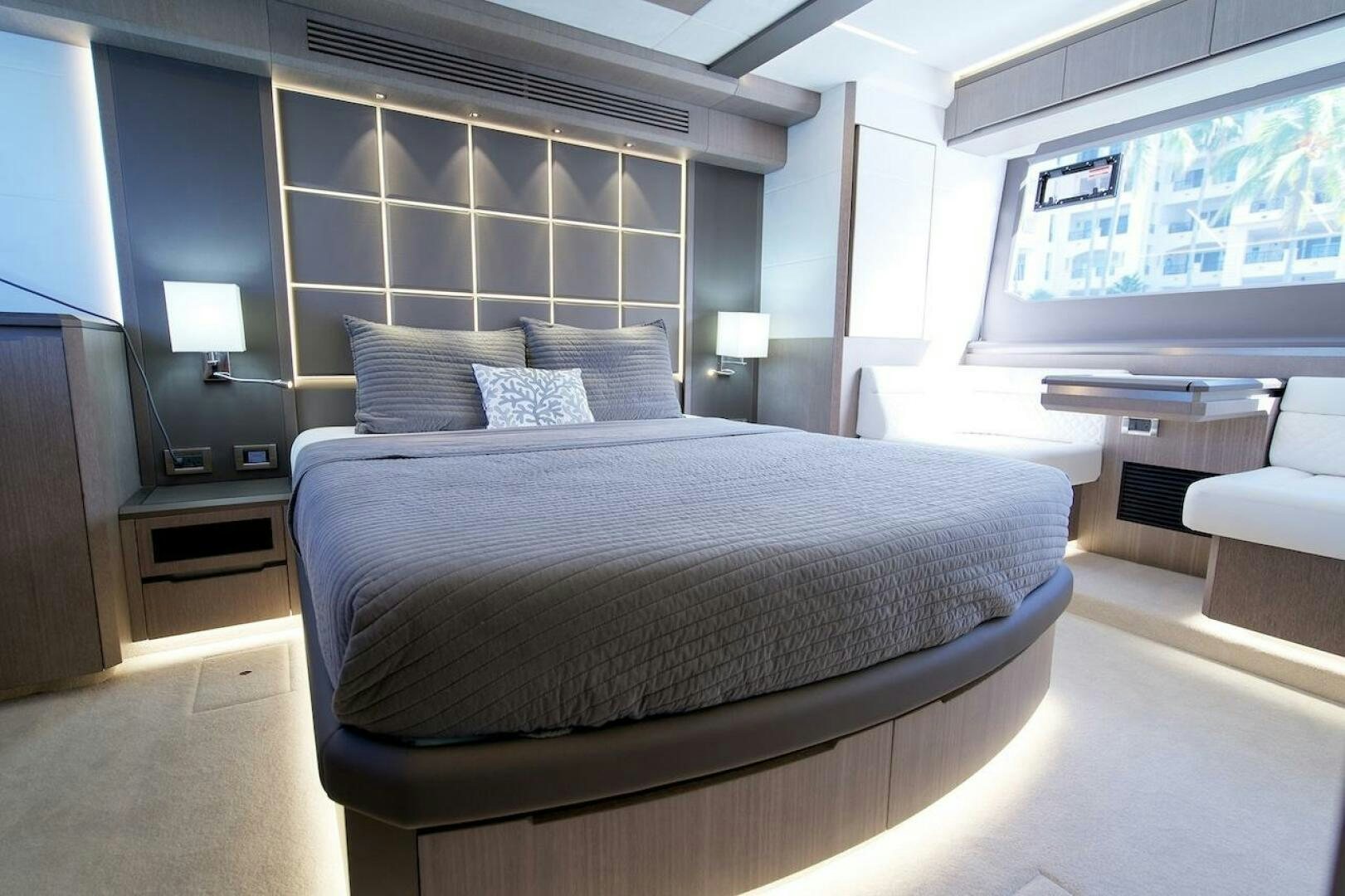 a large bed in a room aboard OUR NEXT CHAPTER Yacht for Sale