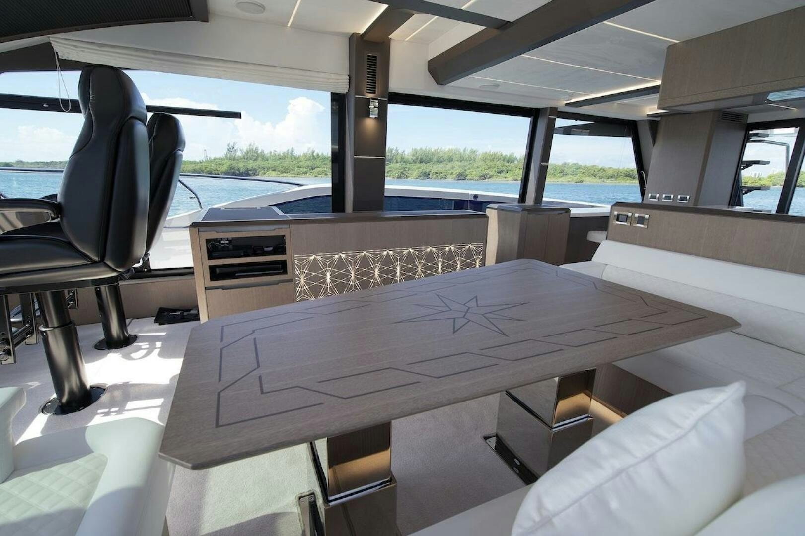 a large table in a boat aboard OUR NEXT CHAPTER Yacht for Sale