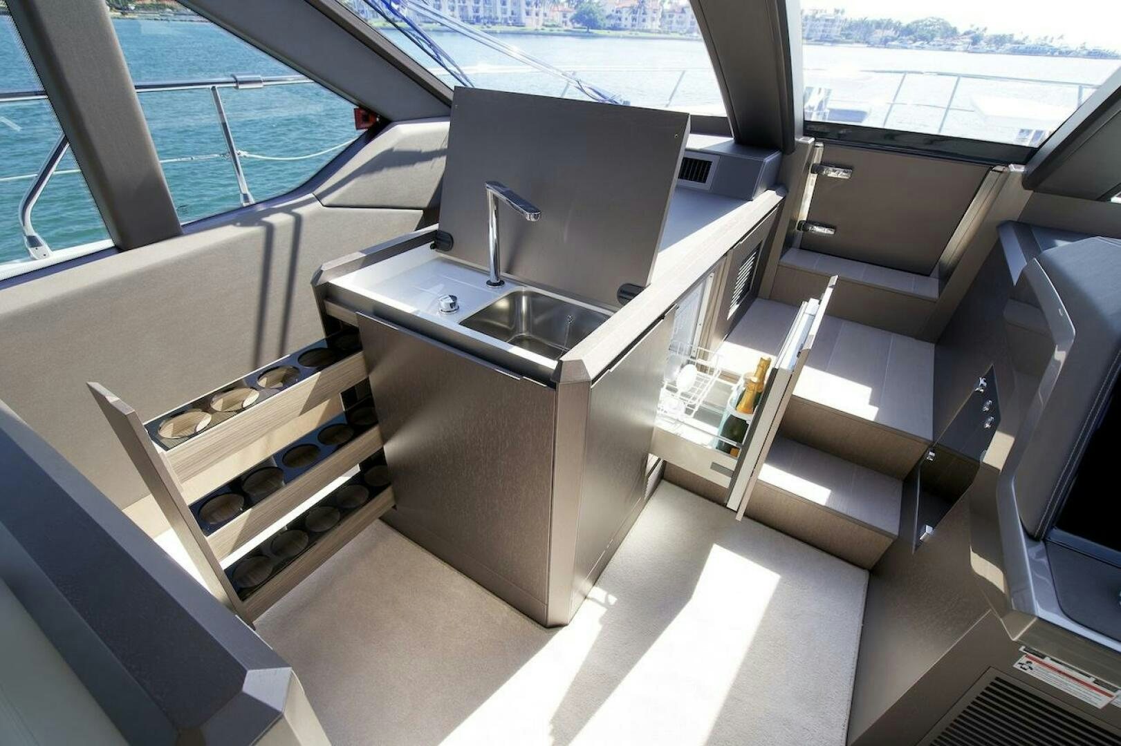 a kitchen with a sink and a window aboard OUR NEXT CHAPTER Yacht for Sale