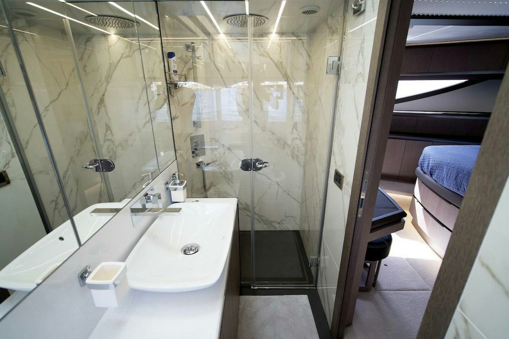 a bathroom with a glass shower aboard OUR NEXT CHAPTER Yacht for Sale