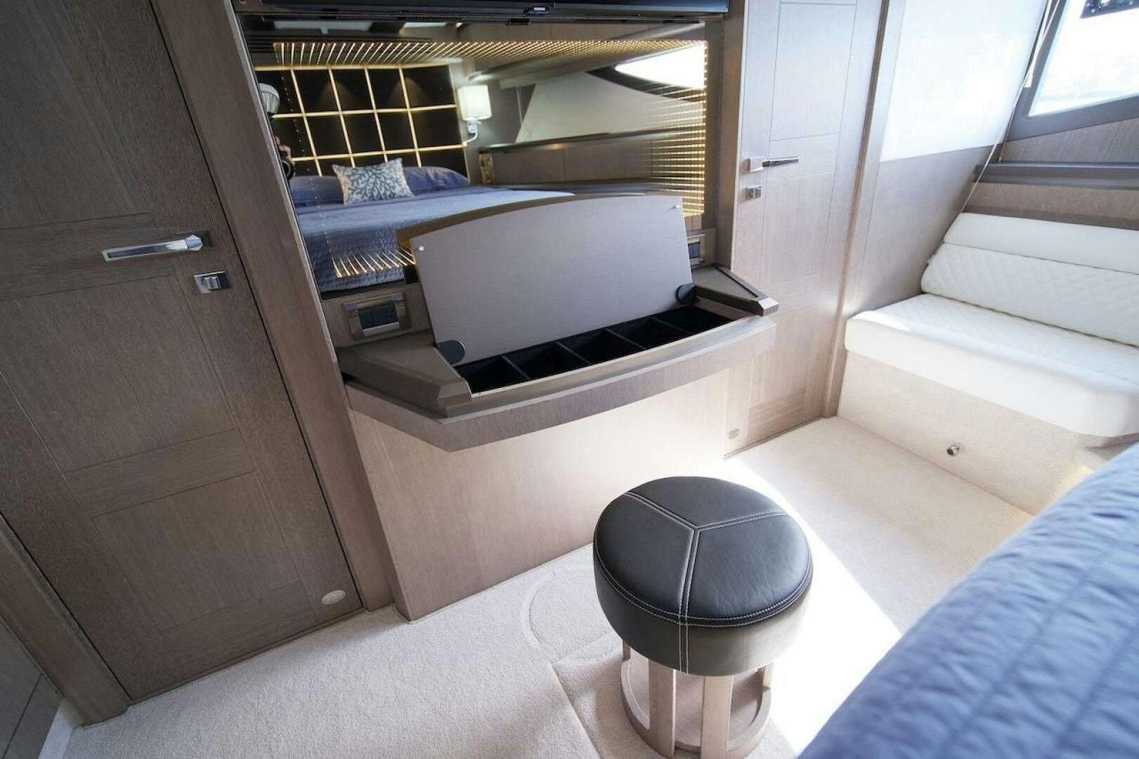 a room with a bed and a desk aboard OUR NEXT CHAPTER Yacht for Sale