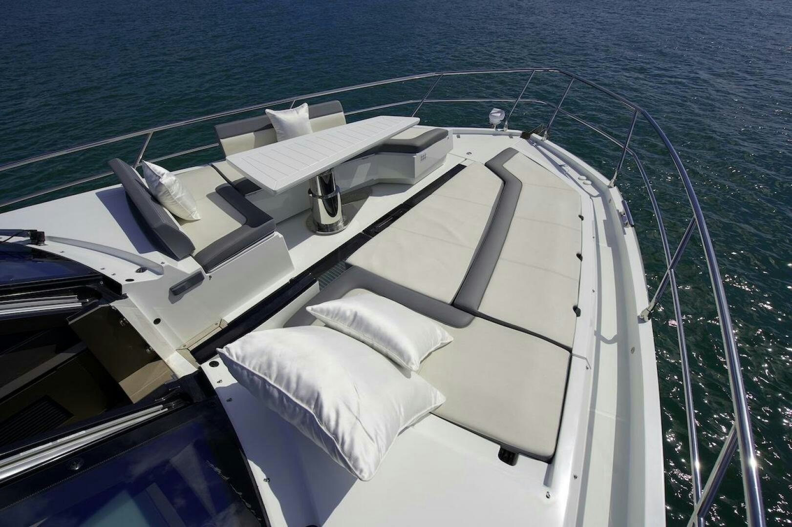 a boat with white pillows aboard OUR NEXT CHAPTER Yacht for Sale