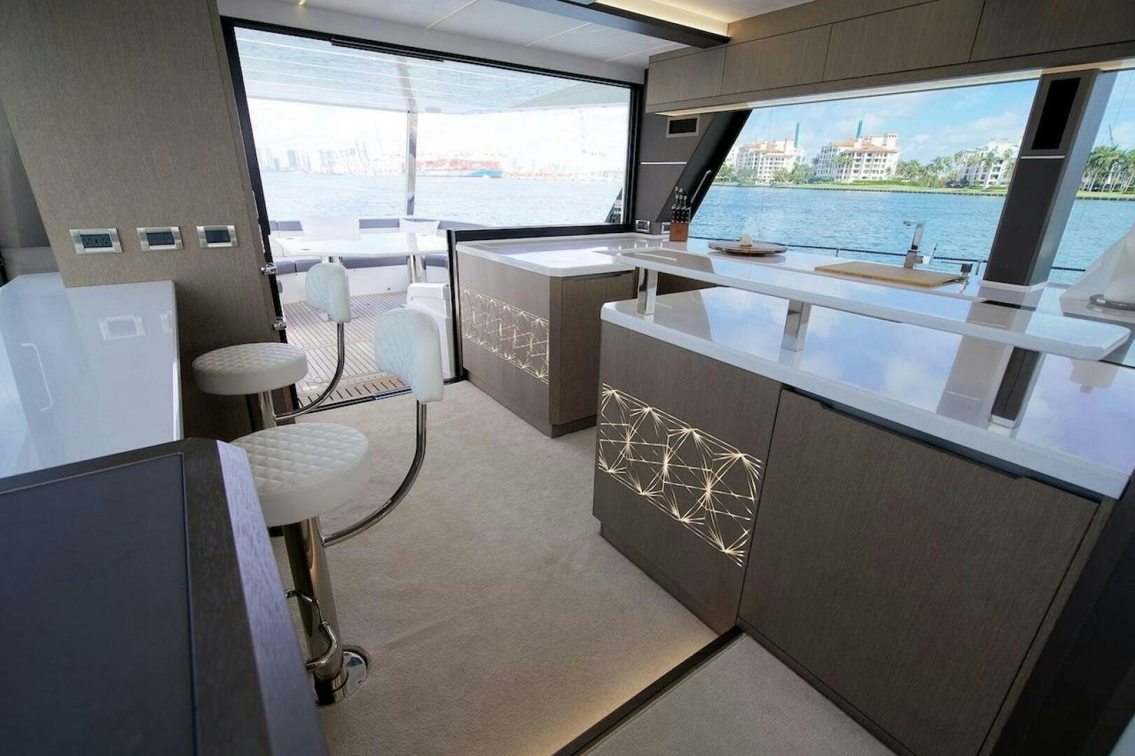 a room with a table and chairs aboard OUR NEXT CHAPTER Yacht for Sale