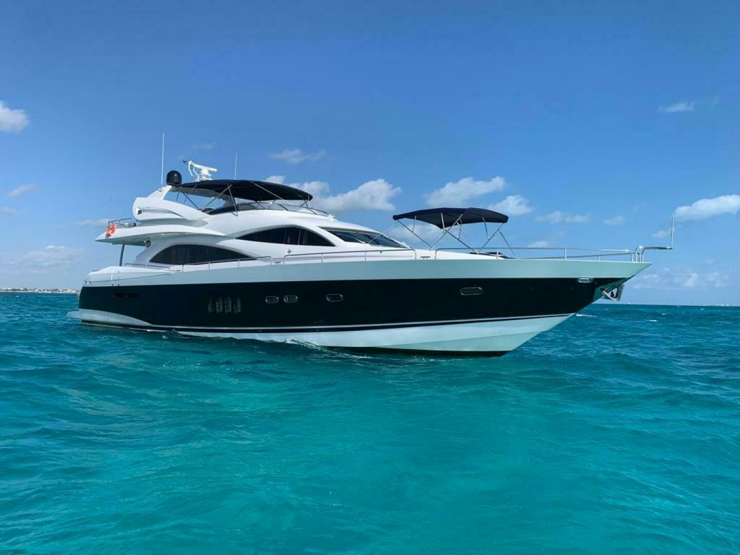 a white yacht in the water aboard JULCAN II Yacht for Sale