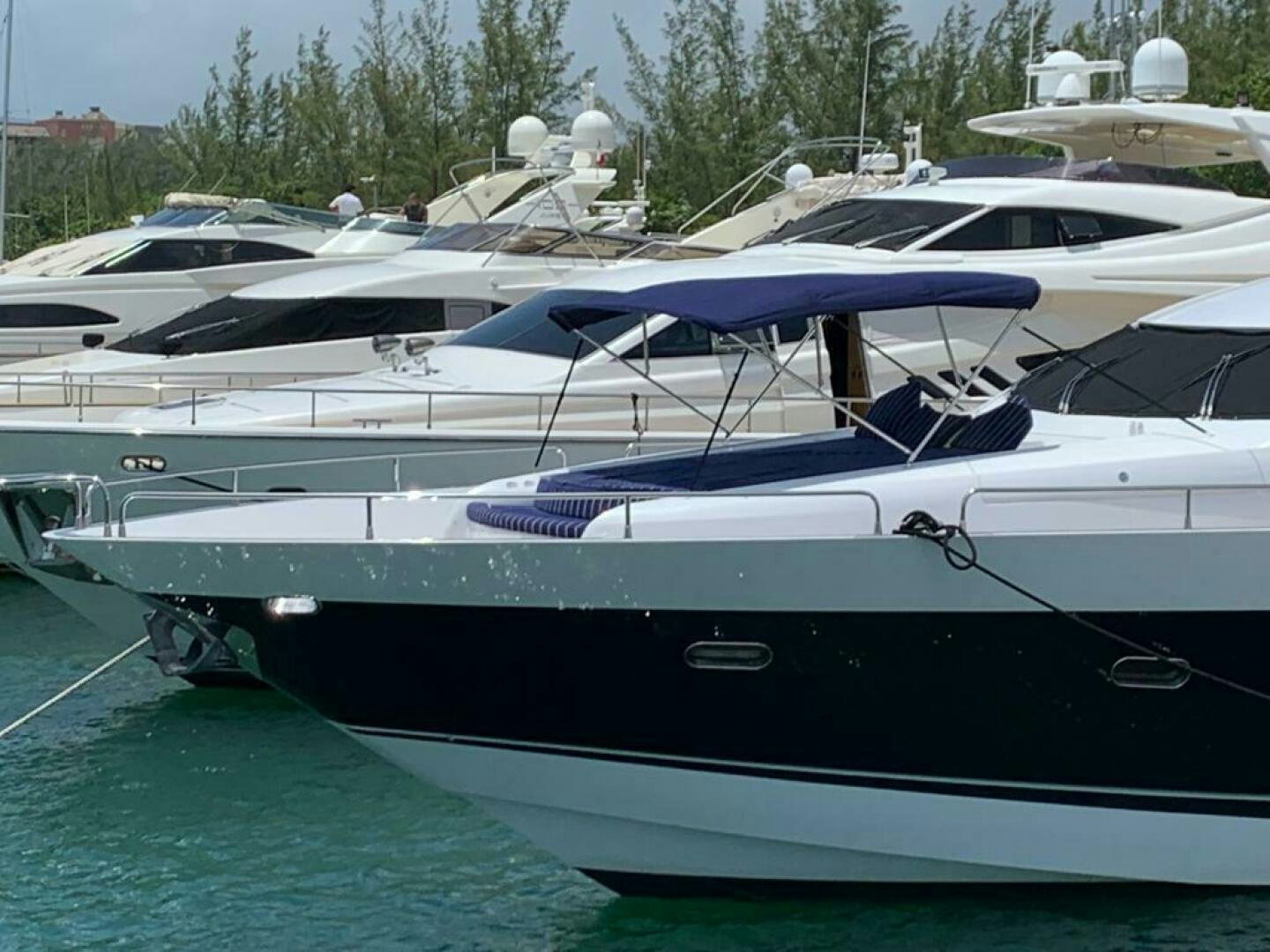 a boat parked on the side of a river aboard JULCAN II Yacht for Sale