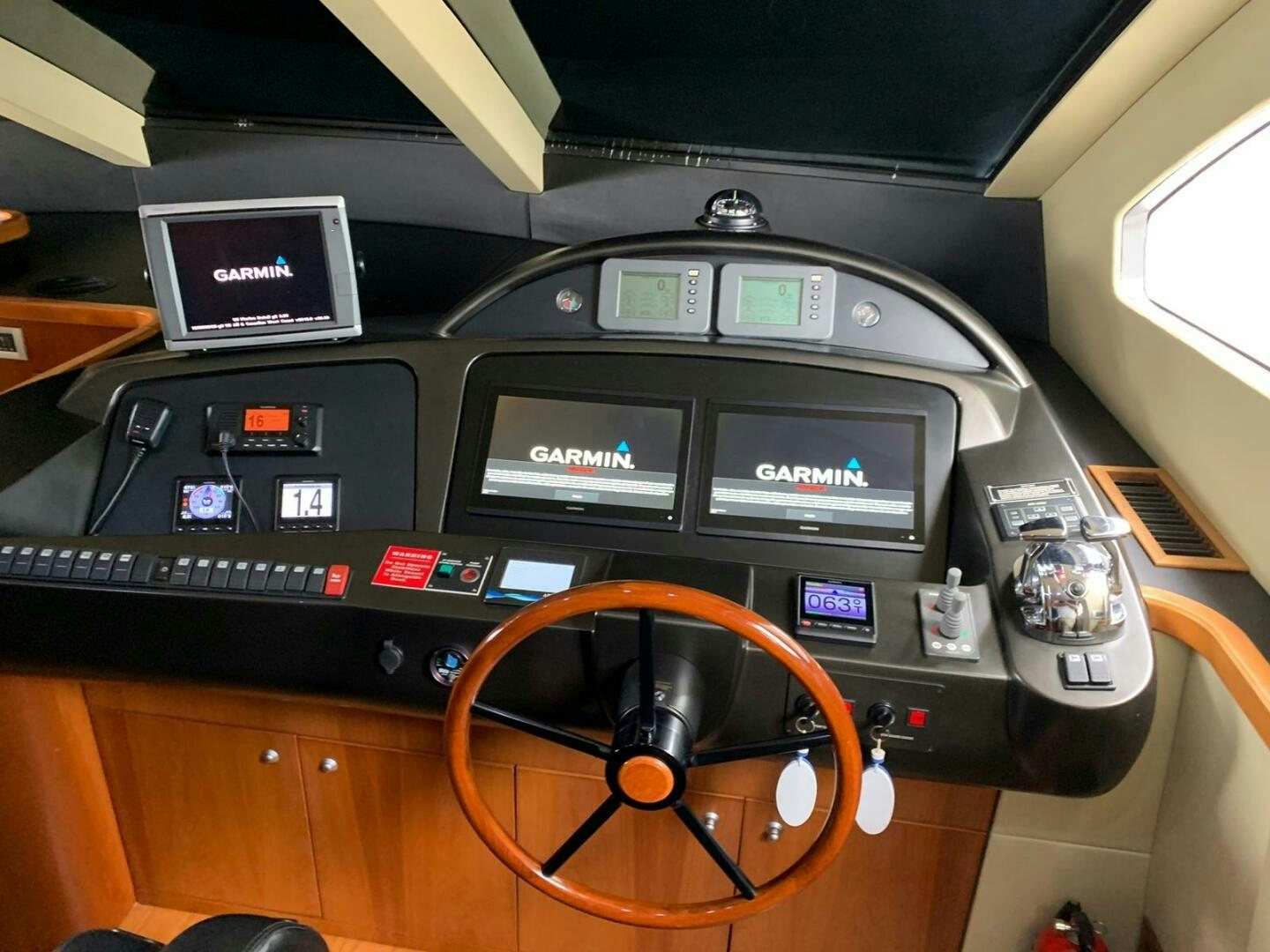 the inside of a car aboard JULCAN II Yacht for Sale