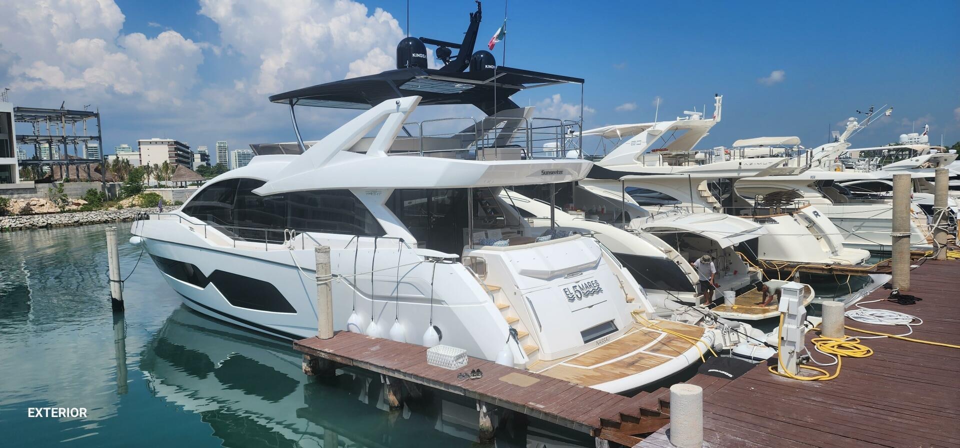 a boat docked at a pier aboard 5 MARES Yacht for Sale