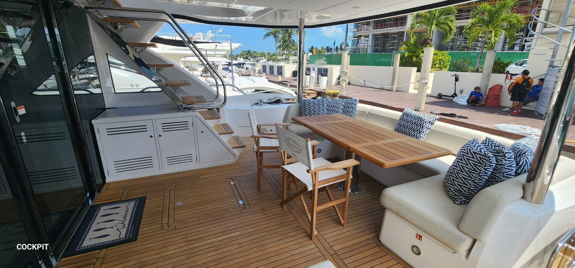 a room with a table and chairs aboard 5 MARES Yacht for Sale