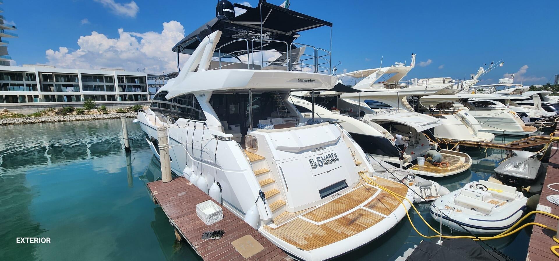 a boat docked at a pier aboard 5 MARES Yacht for Sale