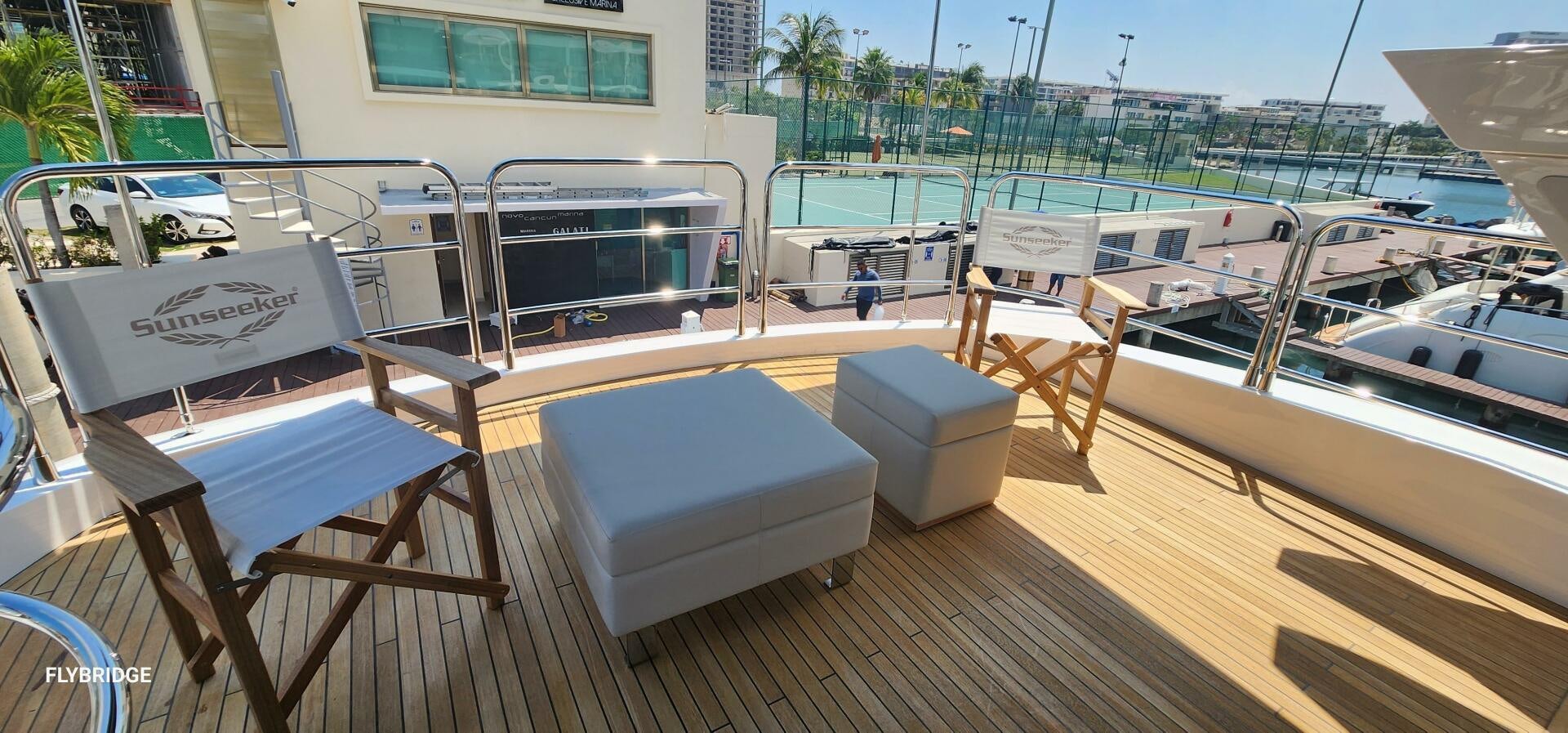 a deck with chairs and tables aboard 5 MARES Yacht for Sale