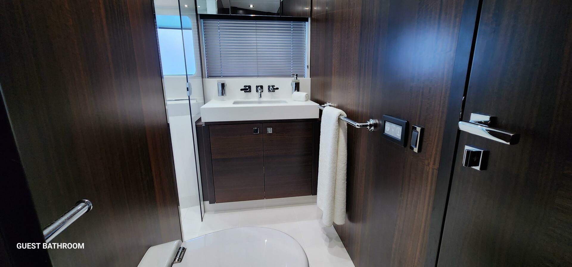 a bathroom with a sink and a bathtub aboard 5 MARES Yacht for Sale