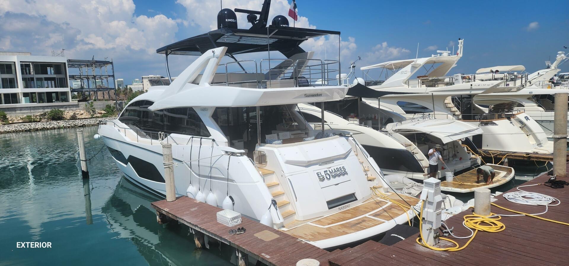 a boat docked at a pier aboard 5 MARES Yacht for Sale